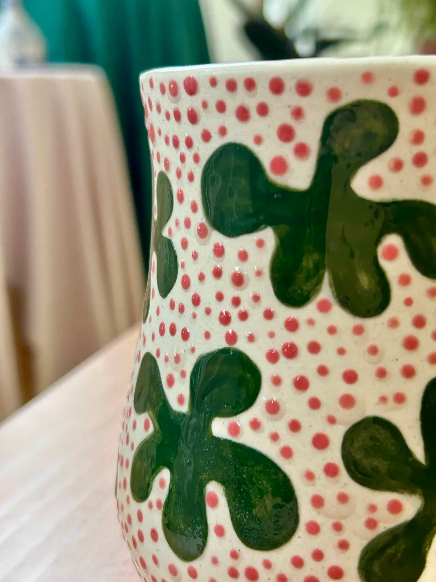 Detalhe do vaso de flores verdes